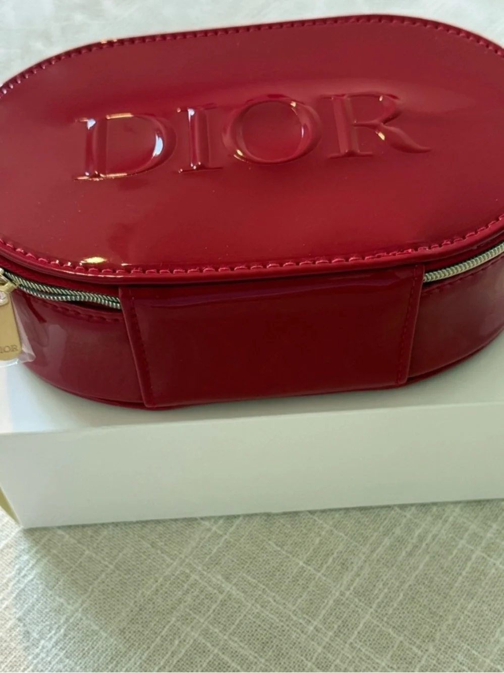 Dior Red Embossed Oval Top-Handle Cosmetic Case